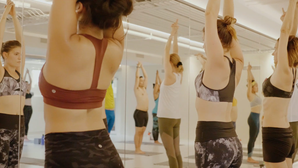 Yoga Flame hot yoga studio in Bern, Switzerland. Group hot yoga class at Yoga Flame Bern.