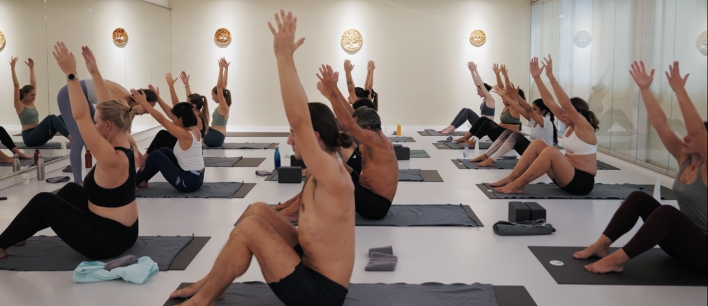 Yoga Flow class at Yoga Flame combining breath, fluid movement, strength and flexibility
